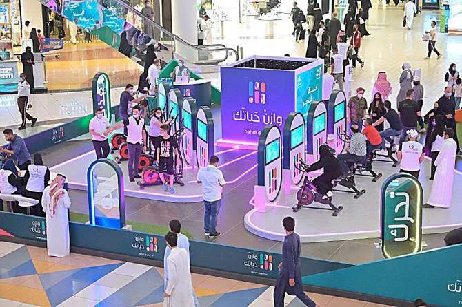 فعالية «وازن حياتك» من النهدي في مركز تجاري، بدراجات رياضية